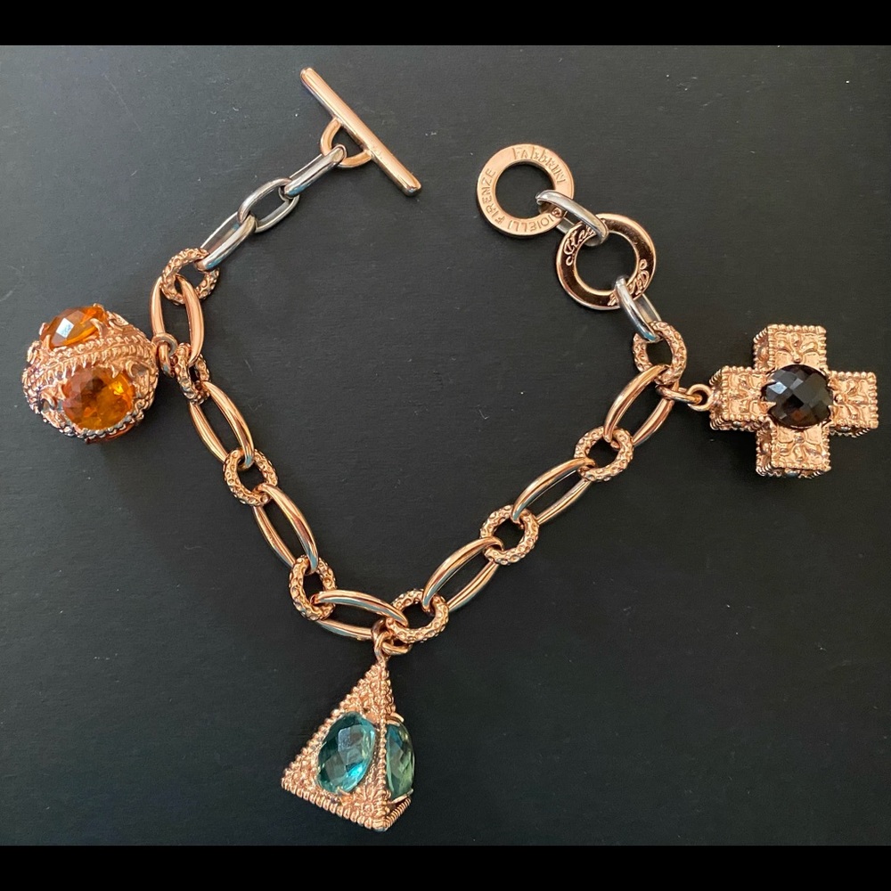 Stainless Steal coated Rose Gold 3 charm toggle bracelet.